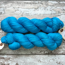 Load image into Gallery viewer, Cyan Sea, merino nylon sock yarn in turquoise blue