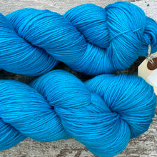 Load image into Gallery viewer, Cyan Sea, merino nylon sock yarn in turquoise blue
