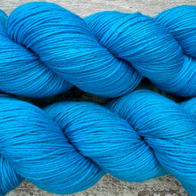 Load image into Gallery viewer, Cyan Sea, merino nylon sock yarn in turquoise blue