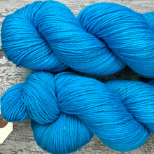 Load image into Gallery viewer, Cyan Sea, merino nylon sock yarn in turquoise blue