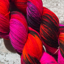 Load image into Gallery viewer, My Life is Lava, UV reactive merino nylon sock yarn