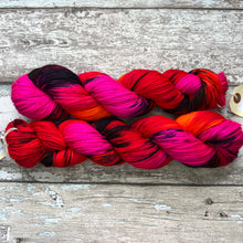 Load image into Gallery viewer, My Life is Lava DK, UV reactive merino nylon yarn