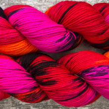 Load image into Gallery viewer, My Life is Lava DK, UV reactive merino nylon yarn